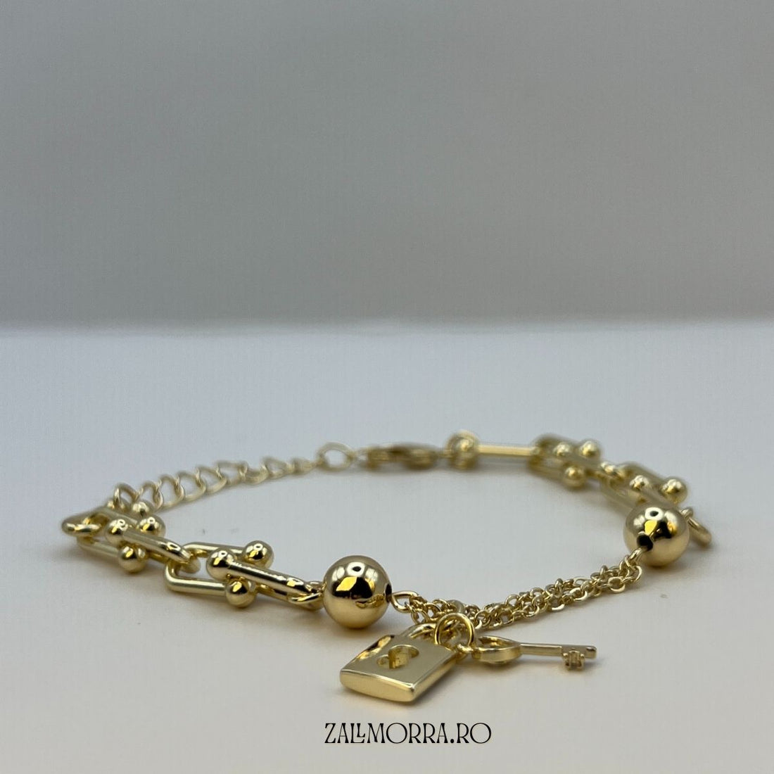 Brățară „Cheia Inimii” – Aurie, Elegantă & Simbolică